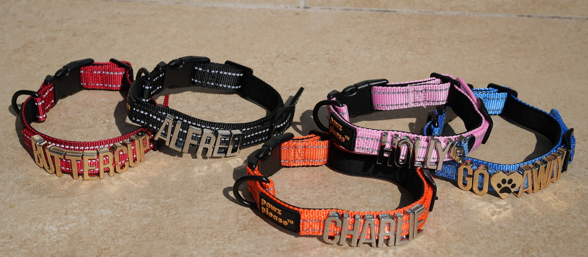 Collection of Pawz Please Collars with various trinkets and designs